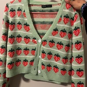 Green cardigan with strawberries